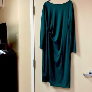 This is an elegant , simple dark green dress